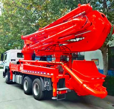 China 6x4 HOWO Cement Boom Truck , 37 / 39 Meter Boom Height Cement Pump Truck for sale