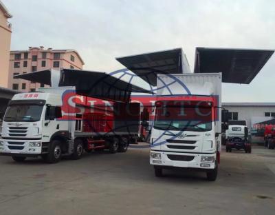 China FAW Cargo Transport Truck Opening Wing Van Truck 3 - 30 Tons Loading Capacity for sale