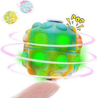 China Eco-Friendly Material Noise Ball Bouncing Person 3D Spinners Toy with Led Push Bubble Relax Gift Silicone Igniting Sensory Bouncing Ball for sale