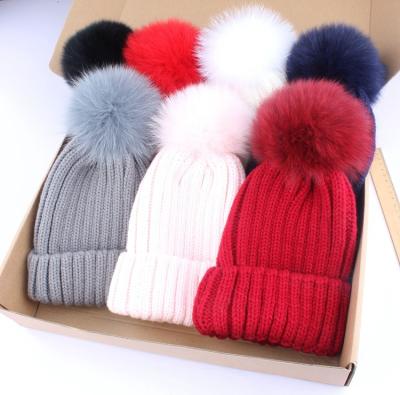 China Classic Winter Beanie Hat Real Raccoon Fur Pom Pom Hats Anti-wrinkle factory price for sale