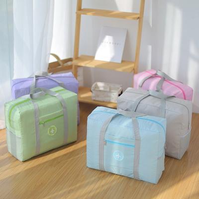 China 2021 Fashion Travel Bag Boarding Trolley Bag Large Capacity Folding Waterproof Storage Bags For Women Men for sale