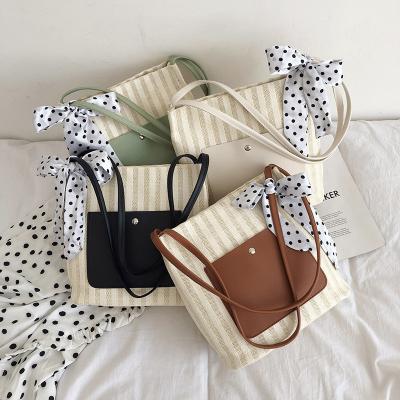 China Fashion Handbag Hot Sale Fashion Casual Straw Woven Shoulder Bag With Dot Bowknot Simple Beach Vacation Female Bag for sale