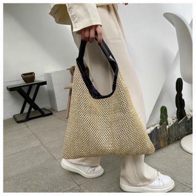 China Fashion Bags For Women Fashion Casual Top-handle Beach Hollow Straw Underarm Shoulder Female Daily Travel Tote Handbags for sale