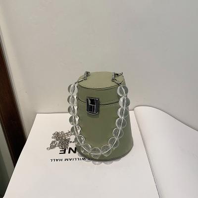 China 2021 New Summer Style Fashion Handbag Girls Pearl Cylinder Elegant Fashion Shoulder Bag Messenger Small Portable Bag Chain Mini Bag for sale