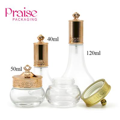 China Gold Glass Cosmetic Unique Luxury Lotion Bottle 40ml 50ml 120ml Cosmetic Packaging for sale