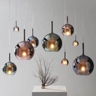 China Contemporary Simple Minimalist Luxury Indoor Copper Bedroom Stairs Nordic Glass Ball Bell Chandelier Led Modern Pendant Light for sale