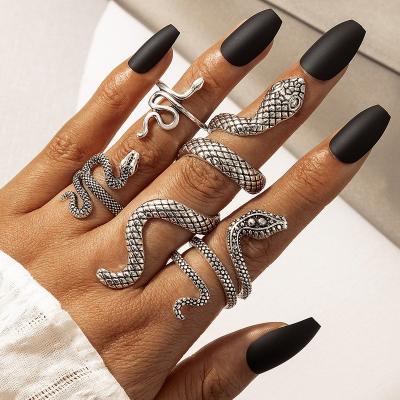 China Vintage Punk Style Fresh Snake Animal Men's Ring Exaggerate Gold Silver Four Piece Punk Ring Jewelry Hot Sale for sale