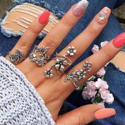 China 4Pcs/Set Vintage Style Ethnic Antique Silver Rings Set Bohemia Rose Flower Leaf Rings Set For Women for sale