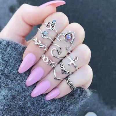 China 10pcs/sets Vintage Silver Flower Cut Out Rings Set V-Shaped Inlay Crystal Knuckle Ring Set For Women Boho Jewelry for sale