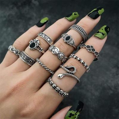 China 12pcs/sets Vintage Black Gem Sun Star Moon Flower Skeleton Snake Ring for sale