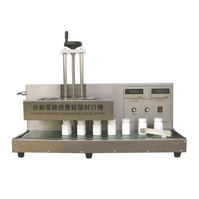 China Constant Aluminum Food Sealing Machine Electromagnetic Induction Continuous Aluminum Foil Sealing Machine for sale