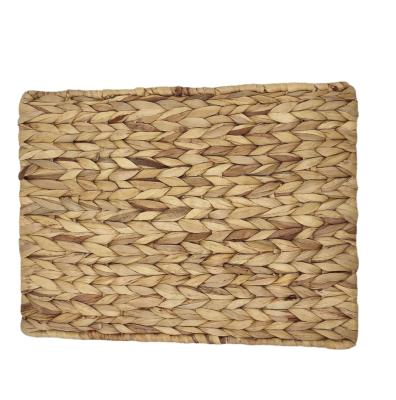 China Rectangular Woven Indoor or Outdoor Sustainable Place Mats Natural Water Hyacinth Braided Rattan Tablemats for sale