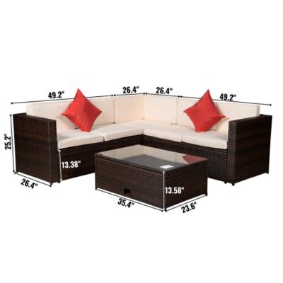 China Outdoor Garden Patio Furniture 4-Piece Brown Cushioned PE Rattan Sofa Sets Waterproof Outdoor Furniture With Pillows And Coffee Table for sale