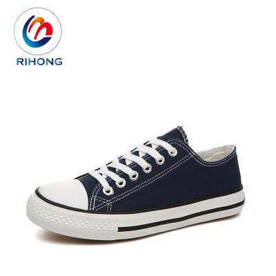 China CUSHIONING Cheap Wholesale China Classic Flat Logo Custom Women Men Canvas Shoes for sale