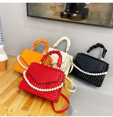 China New fashion autumn and winter women's new fashion shoulder handbag messenger bag solid color pearl chain fashion net red French square waterproof a small for sale