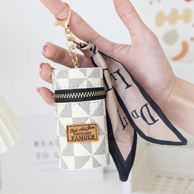 China Mini Lipstick Cosmetic Bag PU Coin Purse Printing Retro Pendant Bag 2022 New Small Earphone Key for sale