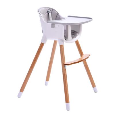 China Modern Portable wood baby highchair feeding convertible wooden baby high chair with removable tray for sale