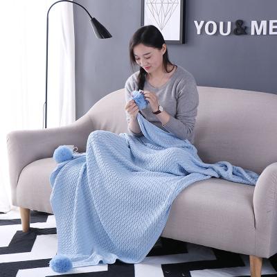 China Wholesale 100% Cotton Folded Knitted Luxury Baby Kids Super Soft Blanket Throw For Sofa Chair With Pompom for sale