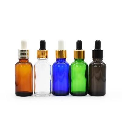 China China Cosmetic Cheap Green Amber Blue Essential Oil Dropper Bottles 1oz 30ml 60ml With Gold Silver Screw Cap for sale