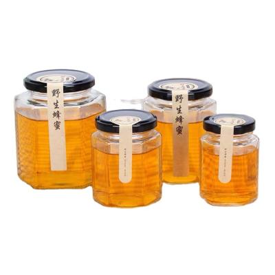 China Freshness Preservation Luxury Honey Jar Honey Jar Honey Packing Glass Jar for sale