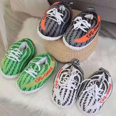 China Fashion trend sale men's and women's winter plush shoes plush home slippers sports shoes warm yeezy slippers for sale