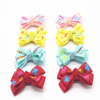 China Beautiful Custom Hand Made Wholesale Fashion Girls Grosgrain Hair Bows With Clips for sale