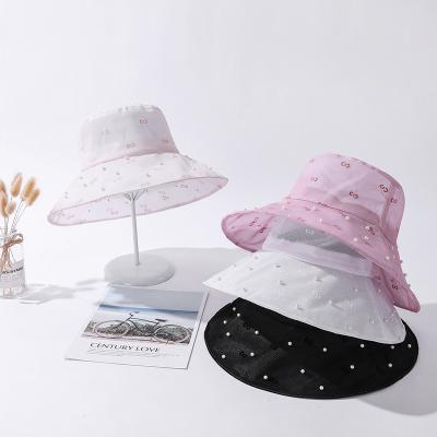 China 2021 new image 4 colors available next wholesale see pearl bucket hat women for sale