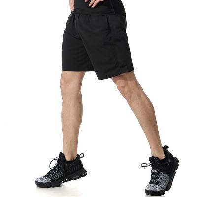 China Breathable Compression Pants Men Running Shorts Sports Pants Mens Shorts With Waist Pockets Loose Gym Shorts for sale