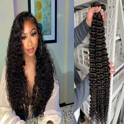 China Shinny Factory 10A Mink Deep Wave Curly Hair Wholesale Bundles With Lace Closure Raw Indian Virgin Hair Vendors for sale