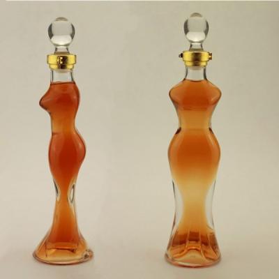 China Customized Logo Acceptable 750ml Female Shaped Vodka Bottle for Liquor Glass Bottle for sale