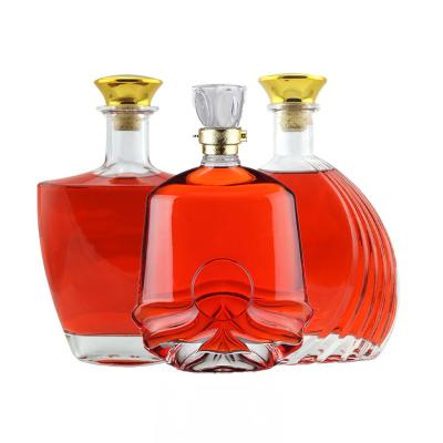 China Transparent or Custom Glass Brandy Bottle 750ml Liquor/Wine Decanter with Carved Design for sale