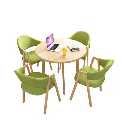 China LANRAN Sectional Eco-Friendly Round Table Set 4 Chairs With Solid Wood And PU Leather Fabric Chairs for sale