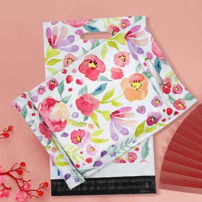 China Interesting Poly Flower Pattern Printing Ads Mailing Bags For Business Rose Sunflower Floral Delivery Mailing Express Courier Bag for sale