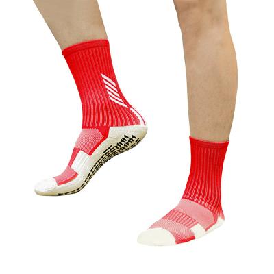 China Sustainable Wholesale Thick Custom Logo Crew Jacquard Anti Slip Football Socks Grips Football Sports Socks for sale