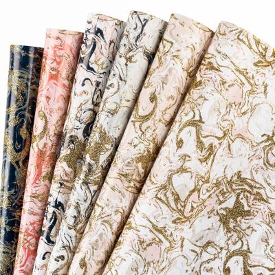 Cina GLITTER MARBLE wrapping paper christmas gift wrapping paper rolls Wholesale christmas wrapping paper in vendita