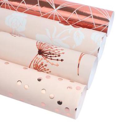 China ROSE GOLD FOIL Custom Printed Wrapping Paper Roll Colorful Tissue Paper Gift Wrapping Paper Manufacturer en venta