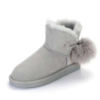 China Kids Light Weight Boots Warm Fur For Girls Heated Boots Pom Pom Cute OEM Sheepskin Striping Boots For Girls for sale