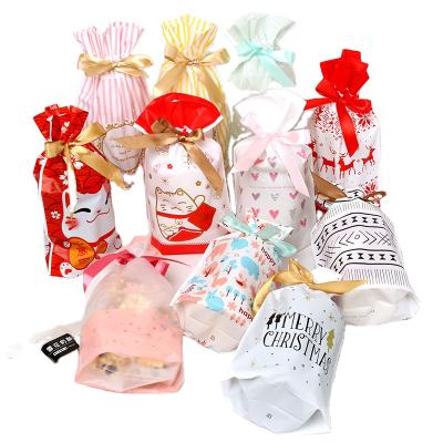 China 50pcs Christmas Snowflake Shortcake Aseptic Drawstring Bag Chocolate Baked Cookies Candy Gift Packaging Bag for sale