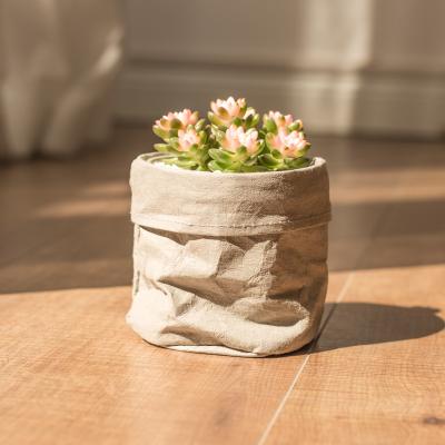 China Storage clothes toys and so on modern style washable wrapping paper with liner flower pots and plastic planter pot cover for sale