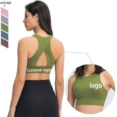 China Antibacterial Customize Gym Clothing Women Fitness Clothing Workout Triangle Hollow Out High Neck Sports Yoga Bra for sale