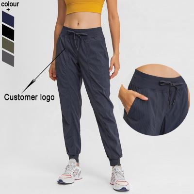 China Customer Logo Womens Jogger Sweatpants Breathable Yoga Pants With Pocket for sale