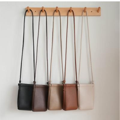 China Mini Size Female Crossbody Bags Mobile Phone Bag Vertical Pu Leather New Waterproof Wholesale Colorful Small Women's Mini Size Female Crossbody Bags Summer Daily Use for sale