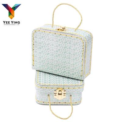 China Creative Handmade Exquisite Paper Girl Suitcase Paper Packaging Box Baby Shopping Gift Box With Handle Jewelry Accessories Storage Box for sale