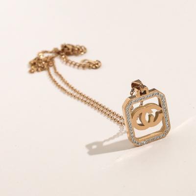 China Vintage hot sale women's double g letter diamond sweater chain men's and women's couple necklace for sale