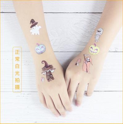 China Temporary 2022 New Fashion Cute Kids Halloween Body Arm Face Tattoo Stickers Children'S Cartoon Pumpkin Luminous Tattoo Sticker for sale