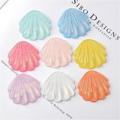 China Global hot big size colorful flat back glitter sea shell resin cabochon for keychain accessories for sale