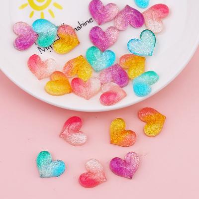 China Global yiwu insheen craft good quality effect gradient colored new glitter heart design flatback resin cabochons for sale