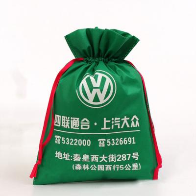 China Promotional Cheap Commercial Handled Hanging Non Woven Hotel Laundry Bag Drawstring Pocket Non Woven Bag for sale