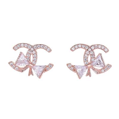 China New Accessories and Shape New Fashion Accessories and Women's White Gold Plated Stud Earrings Girls Shape Bowknot Letter Earrings Micro Insert Zircon Earrings for sale