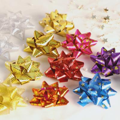 China Metallic Gift Wrapping Ribbon Star Bow Christmas Customized Gift Finish Decoration With Self Adhesive Flower Ribbon Pull Flower For 7 Days for sale